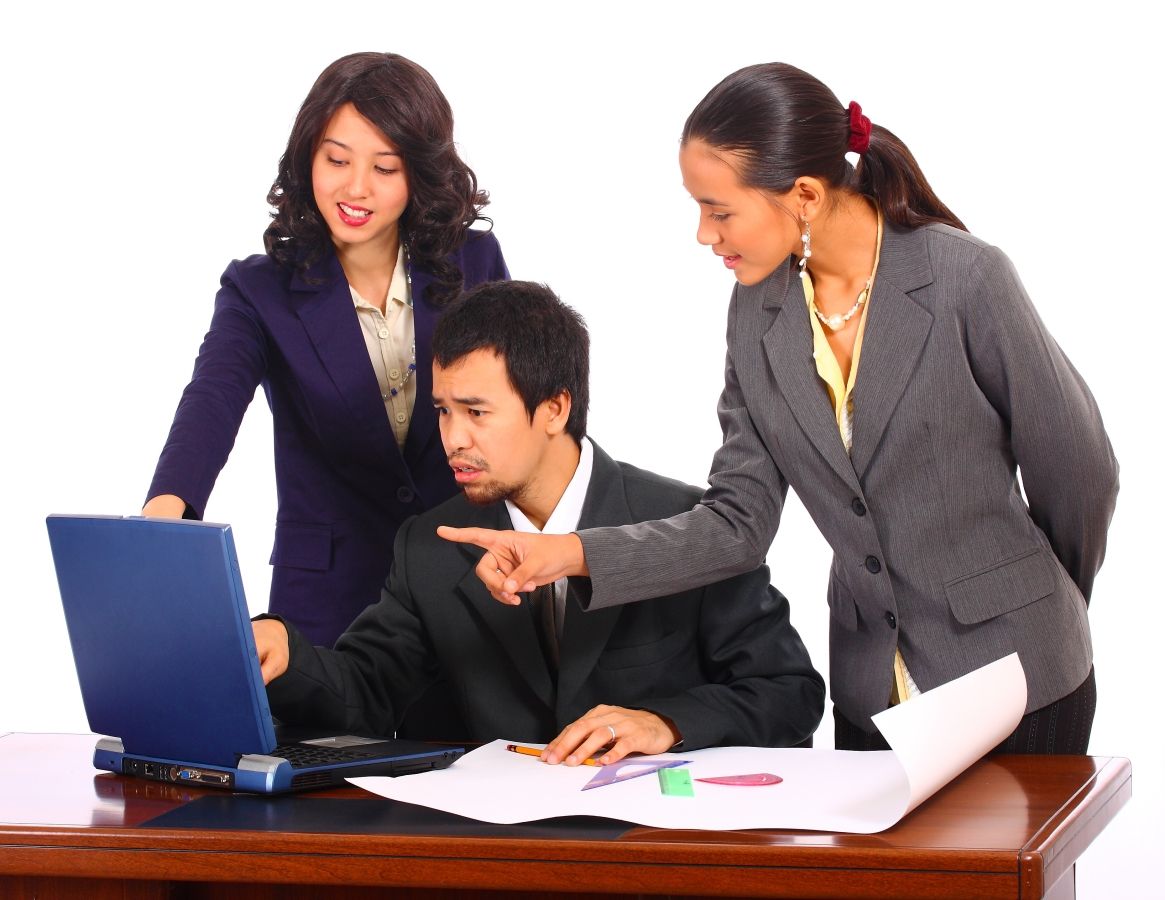Optimized-workers-in-an-office-working-together-SBI-300186405.jpg