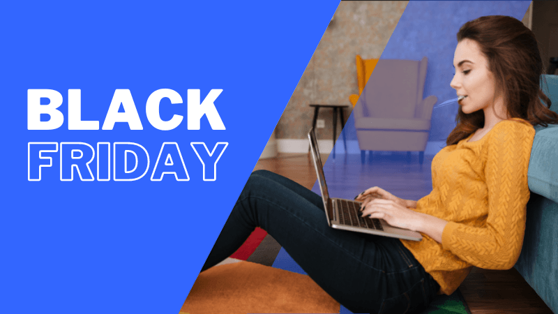 A retailer performing black friday customer service on her laptop