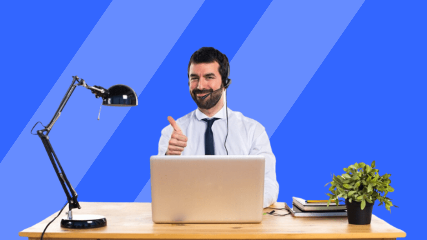 A call center agent guy working on his desk
