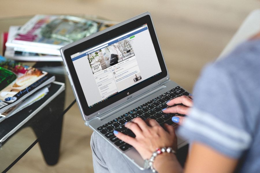 person-browsing-on-facebook-using-a-laptop.jpg