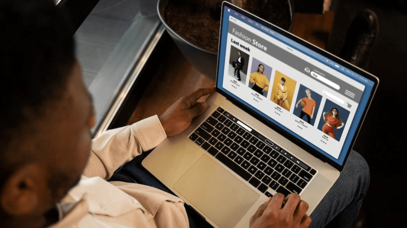A close up shot of a man shopping online